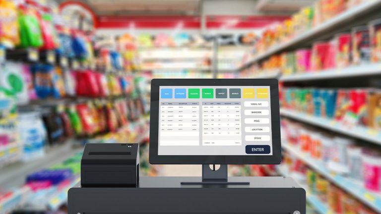 Cash register and isles of goods.